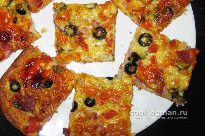 Фото пиццы с ветчиной и солями