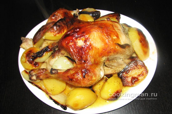 Фото курицы запеченной в духовке с картошкой и луком